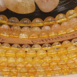 Perle pierre naturelle citrine ronde en 4/6/8/10mm pour la création de bijoux et lithothérapie - La Pierre Fr 